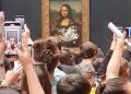 WATCH: Mona Lisa painting smeared in cream in climate protest stunt