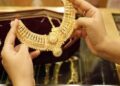 Gold pares losses on strengthening rupee, price plunges by Rs2,100 per tola