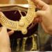 Gold pares losses on strengthening rupee, price plunges by Rs2,100 per tola