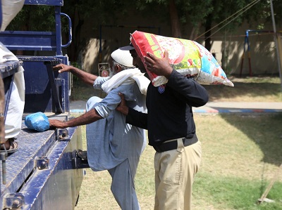 Distribution of ration bags continues on 17th day among the rain & flood victims of Tambu Goth Jamshoro in Police Headquarters Hyderabad