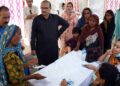 SEHWAN: Doctors are busy in examining the flood effected people at medical relief camp organized by Liaquat University of Medical & Health Sciences (LUMHS), in Lal Bagh.