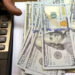 Dollar on slippery slope against rupee, slides by 0.07% in interbank