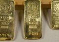 Gold gains as political, economic uncertainty lingers