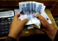 Probability of currency crisis exceeds 50%, says Bloomberg report