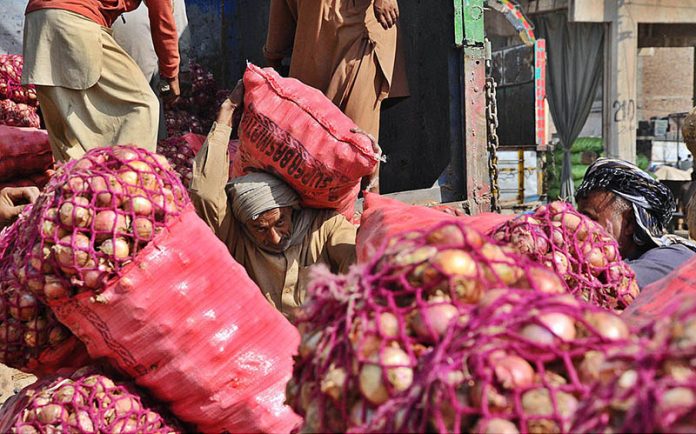 As prices rise in markets, scores of  containers with onions tuck at port