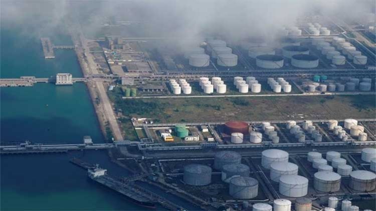 Oil dips $1 on interest rate fears, but OPEC+ cuts limit fall