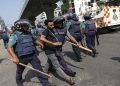 Bangladesh imposes nationwide curfew as deadly protests over government jobs escalate
