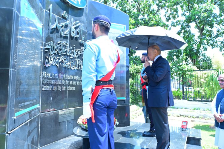 Prime Minister Muhammad Shehbaz Sharif laying a floral wreath at the Yadgar-e-Shuhada at the FBR Headquarters in Islamabad on July 13, 2024.