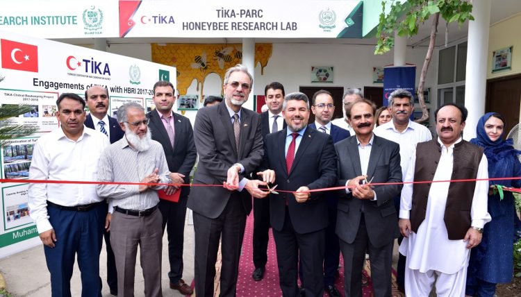 Ambassador of Turkey to Pakistan inaugurating a laboratory of beehive products at the Honey Bee Research Institute.