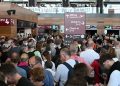 Millions hit after worldwide IT glitch paralyses travel, banking, business services