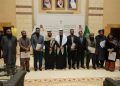 Saudi ambassador hands over travel documents to Pakistani Umrah pilgrims invited as state guests
