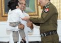 A courageous and talented youth suffering from congenital disorders visited Central Police Office