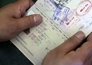 Fake visa travellers face action