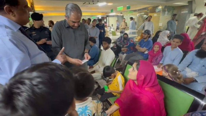 Mohsin Naqvi pays surprise visit to NADRA Center, passport office